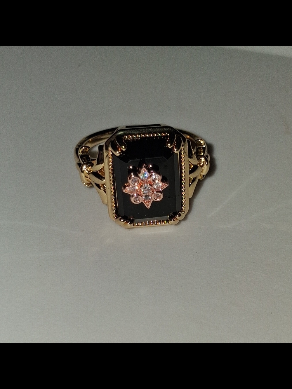 Gold Black Spinel Ring with Rose Gold Flower Accent